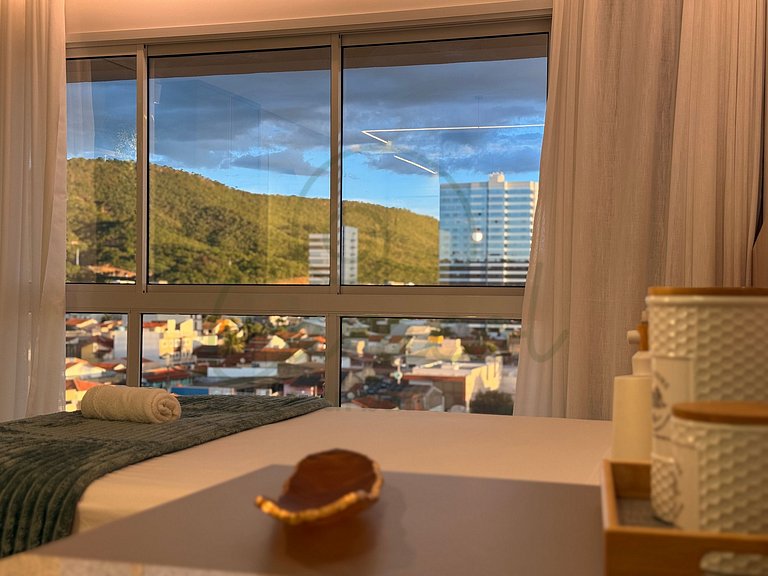 Charmoso Studio com vista incrível