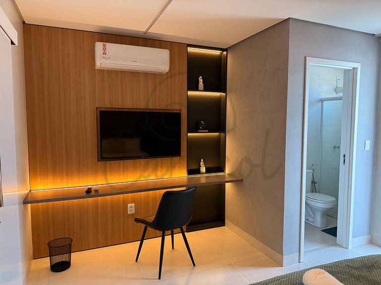 Apartamento com suíte e varanda no centro